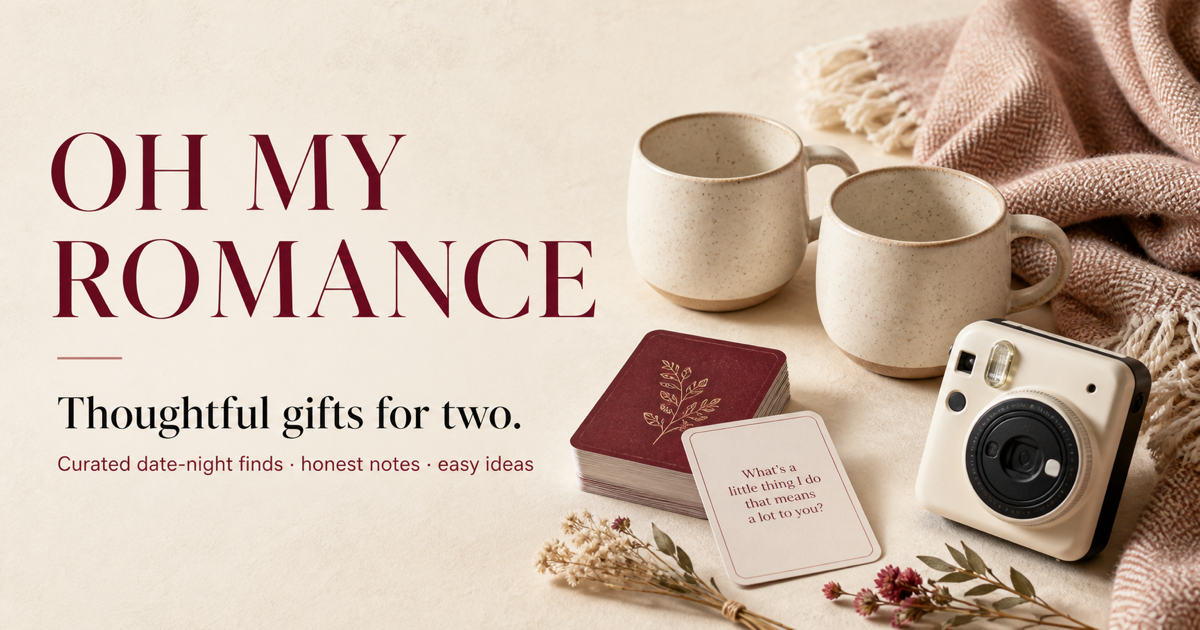 A warm date-night flat lay with mugs, conversation cards, an instant camera and a throw blanket